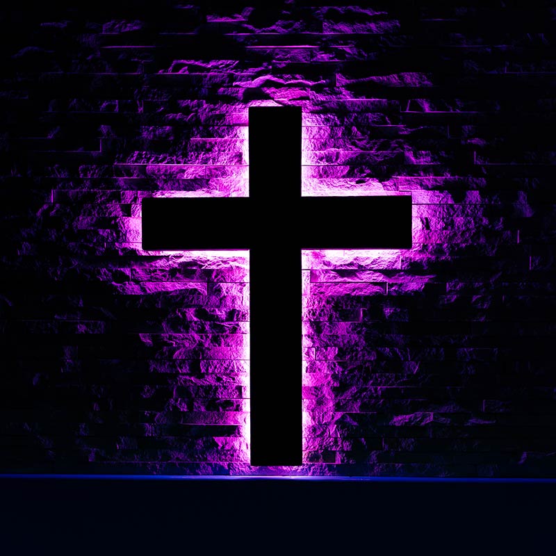 Backlit glowing cross